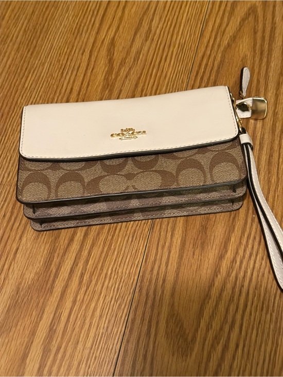 Coach Handbags - Coach Chalk and Tan Signature Canvas Wristlet with Gold Hardware